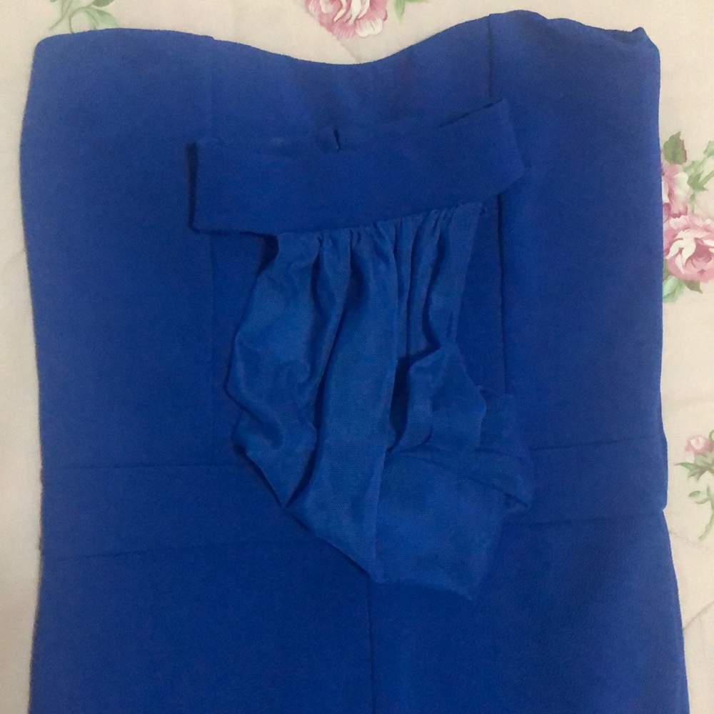 A blue straplesss romper